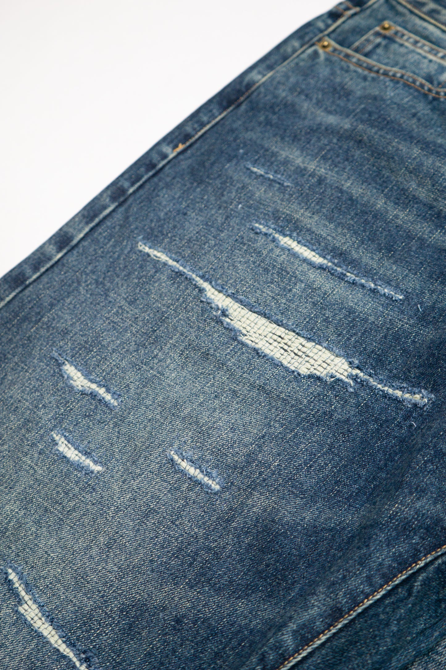 DUSTY THRASHED DENIM PANTS