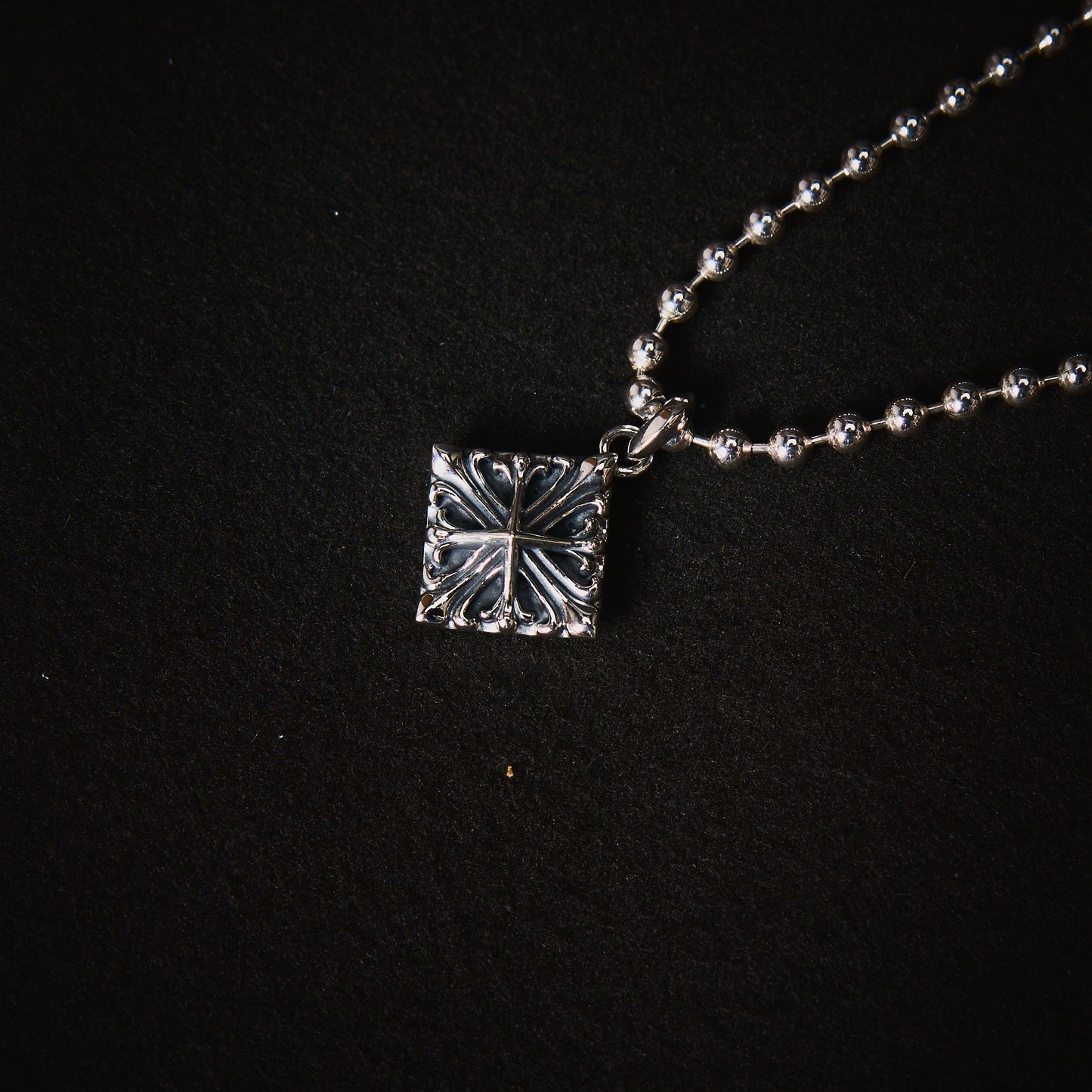DUSTY SILVER CROSS LOCKET