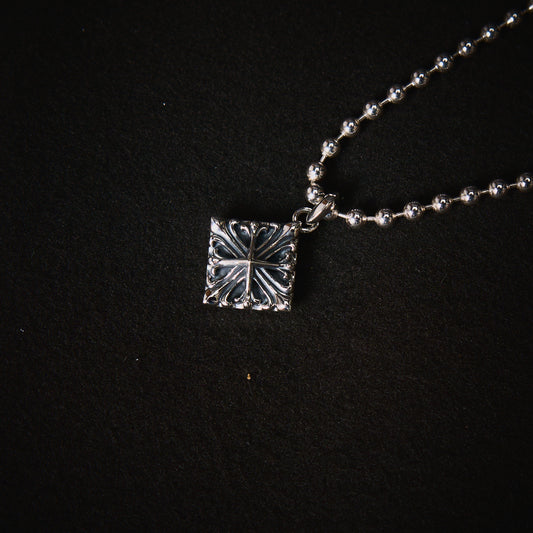 DUSTY SILVER CROSS LOCKET